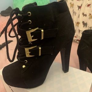 Black suede buckle heels